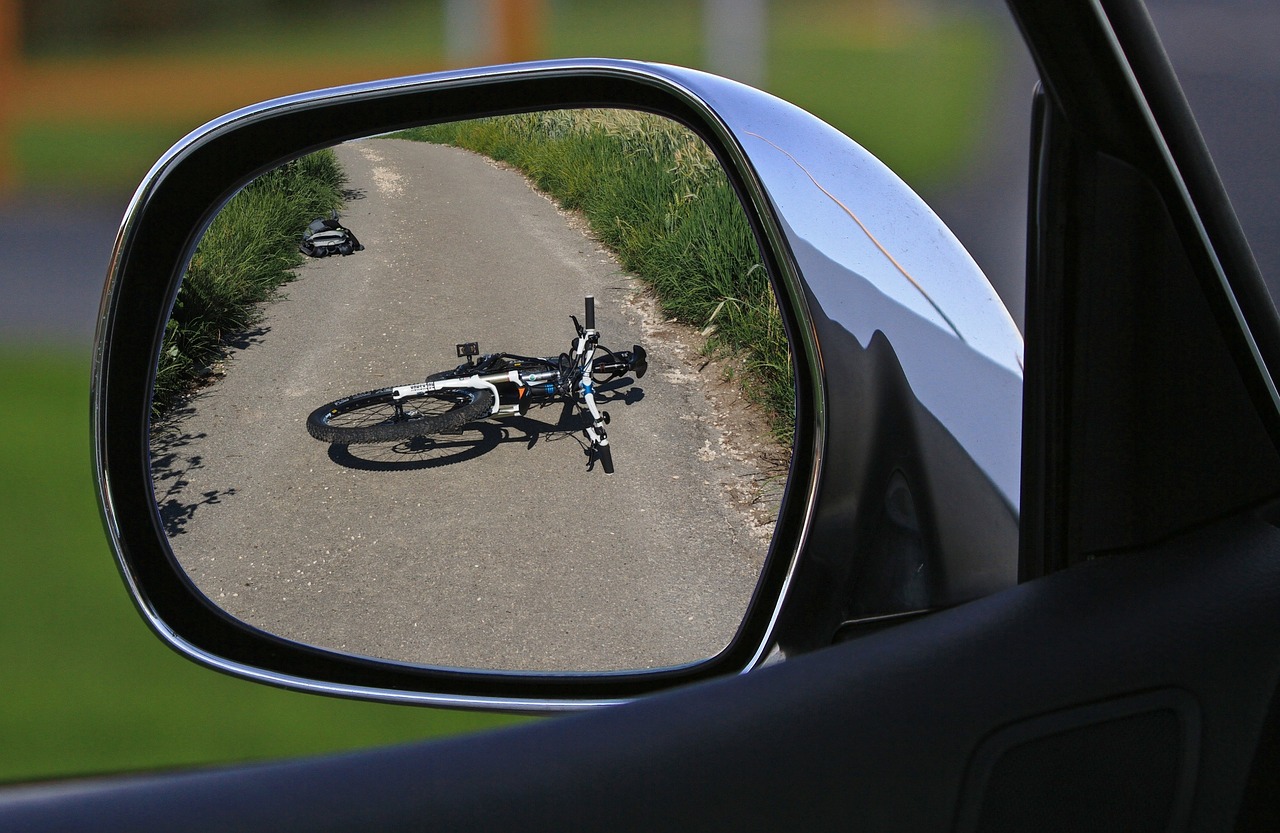 Image of a Fallen Bicycle in a Side Mirror - Witnessing an Accident in Israel